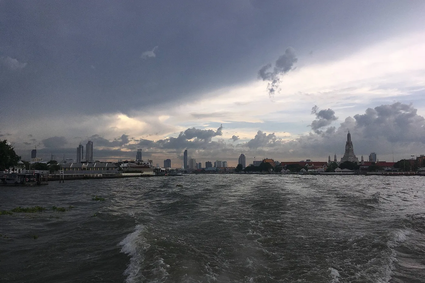 The Chao Phraya River from an express boat, Wat Arun's spire on the skyline