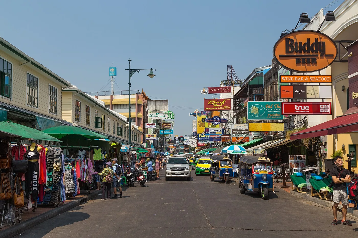 Backpackers' stalls, bars and tuk-tuks along Khao San Road in Bangkok's old city