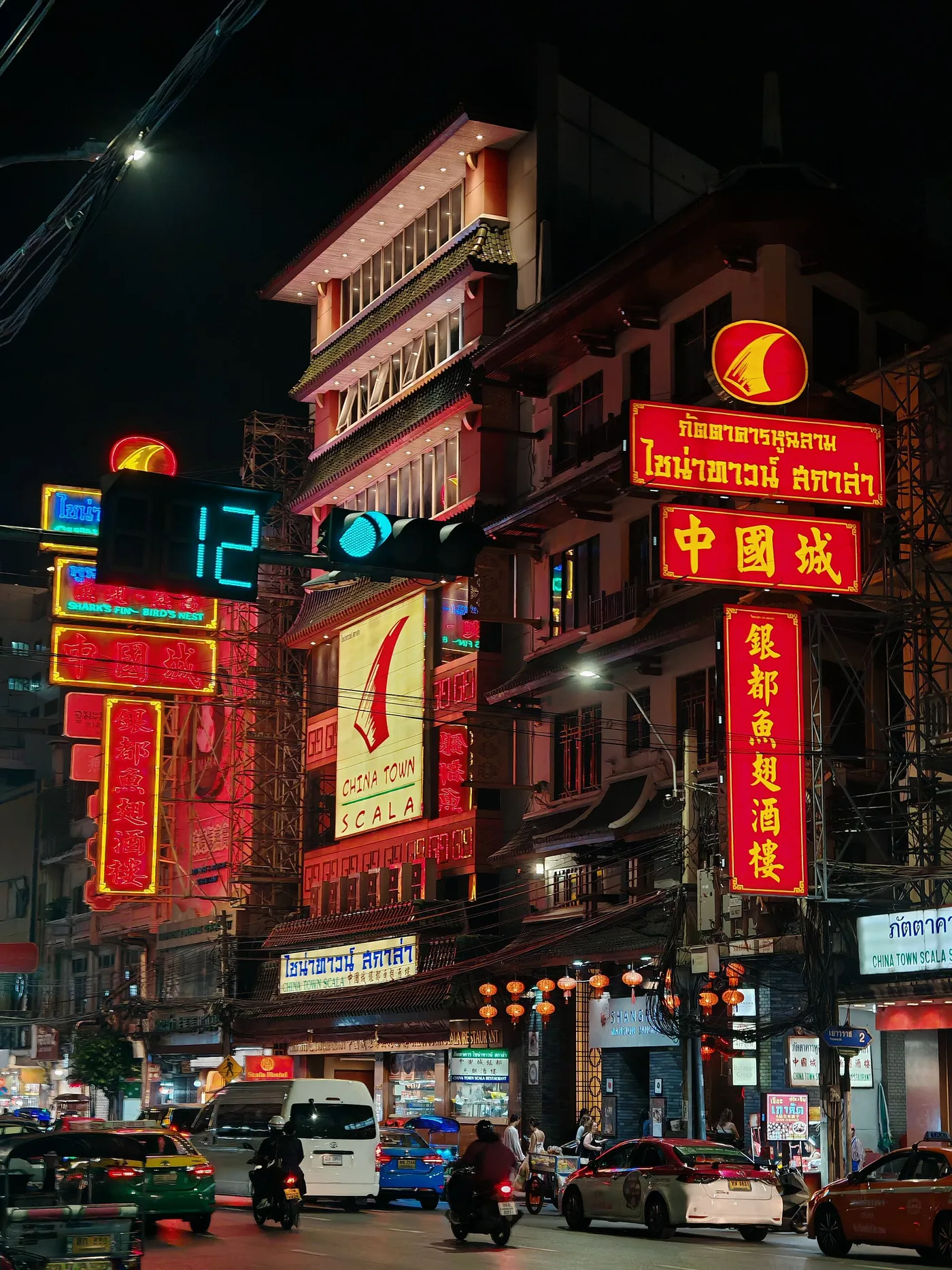 The neon-lit Yaowarat Chinatown street in Bangkok at night