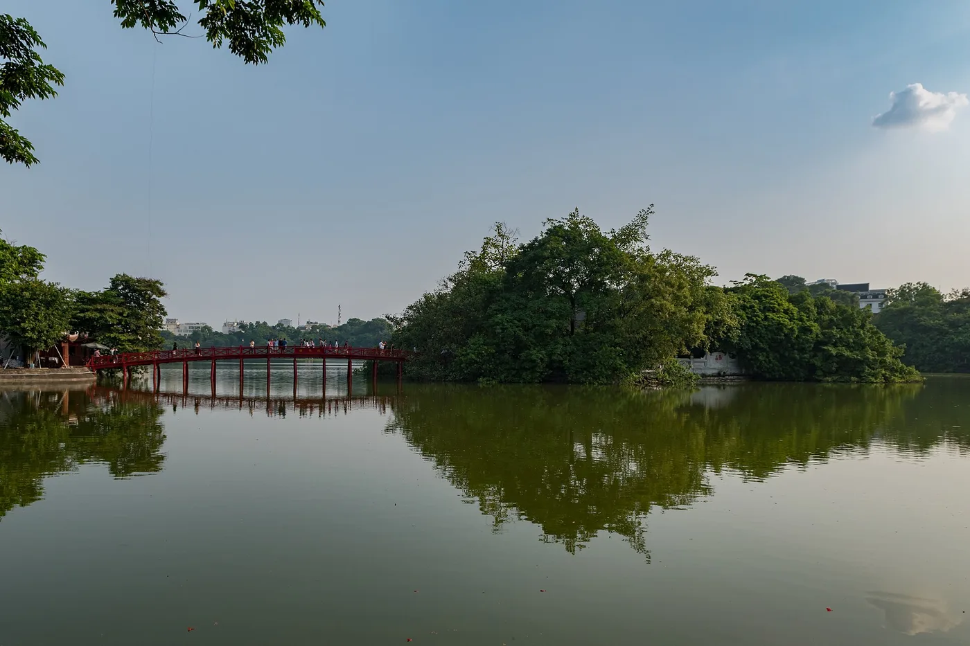 Hoan Kiem Lake and the red Huc Bridge in central Hanoi