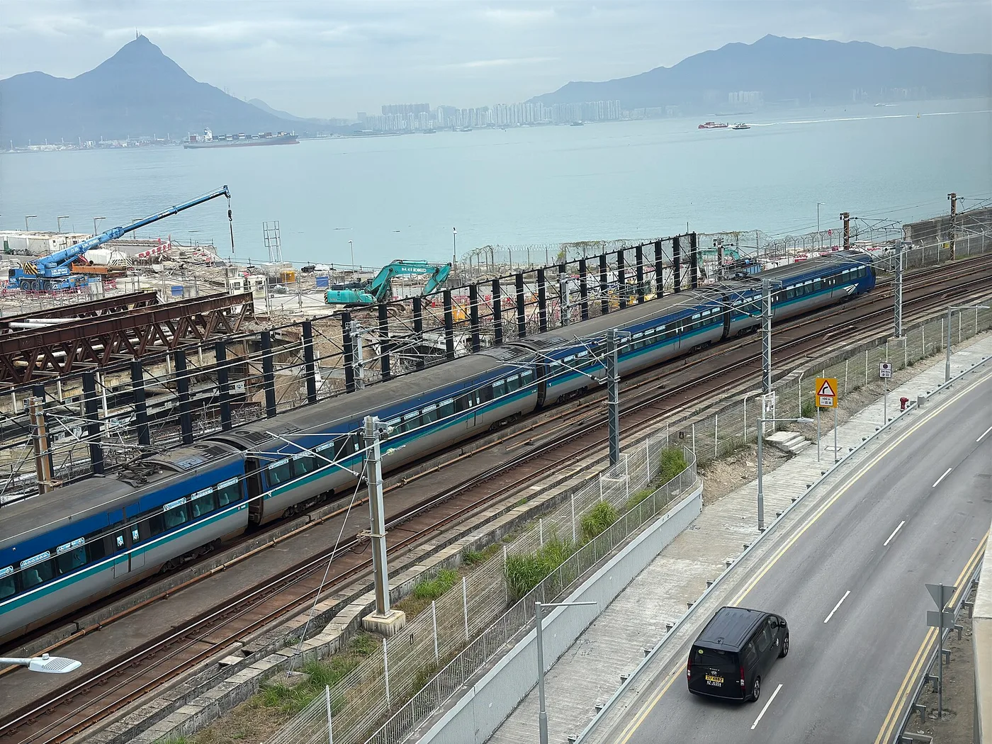 The Airport Express train on elevated coastal tracks