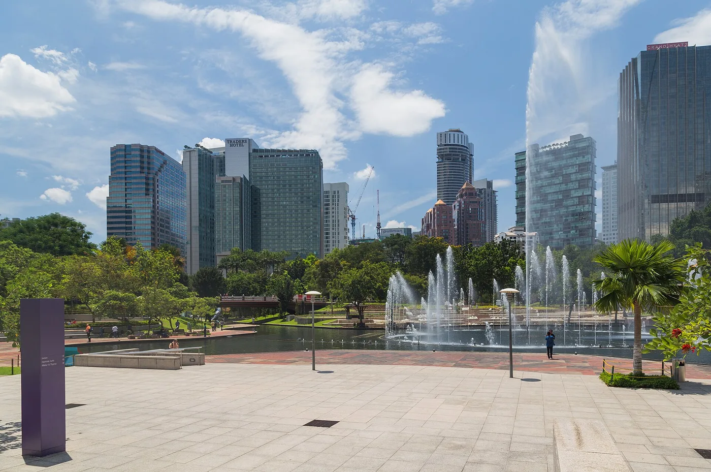 The Symphony Lake fountains playing in KLCC Park below the city towers