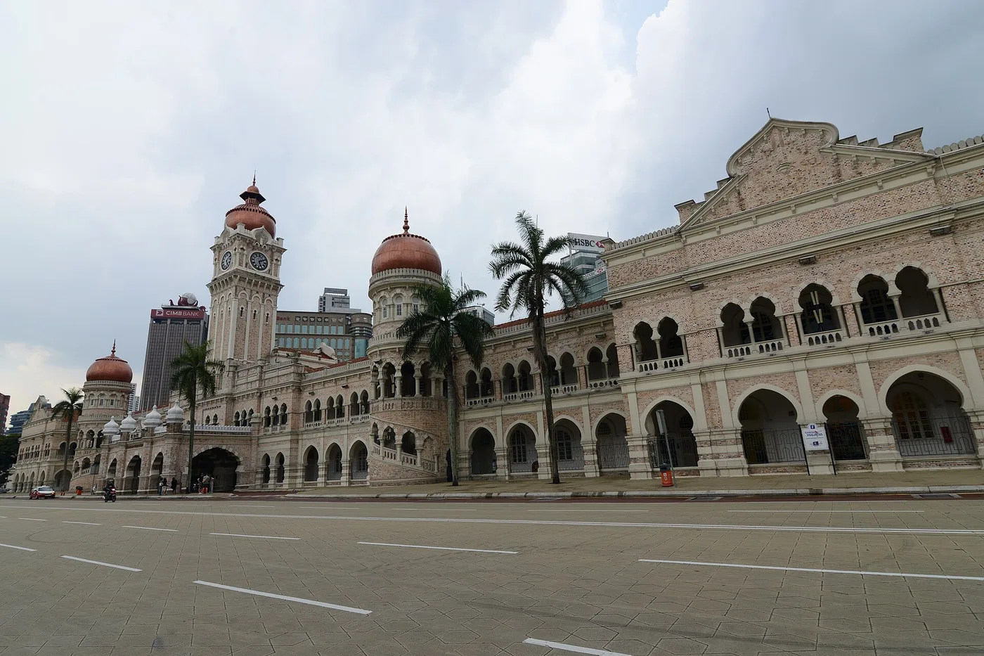 The Sultan Abdul Samad Building on Merdeka Square, its copper domes and clock tower against the sky