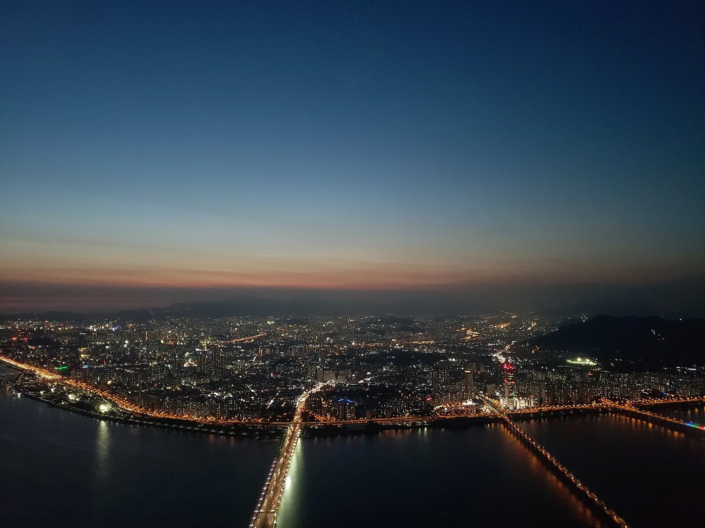 The Seoul skyline and the Han River at dusk