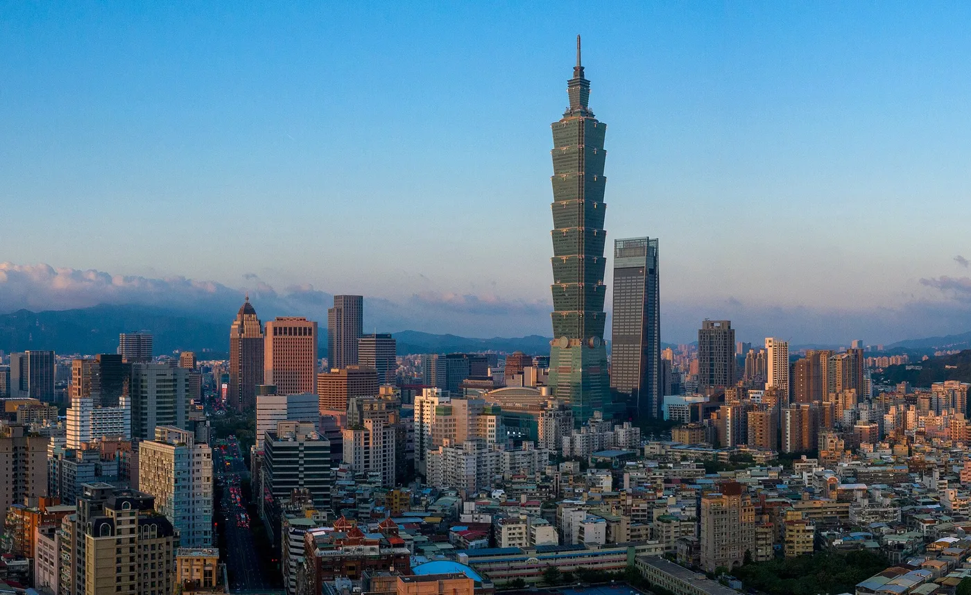 The Taipei skyline at dusk with the Taipei 101 tower